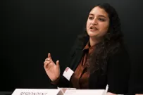 Nathalie Kneisel from the University of Zurich has the floor first.